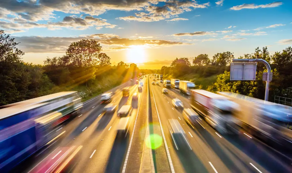 Highway traffic during summer heat impacting freight and delivery schedule.