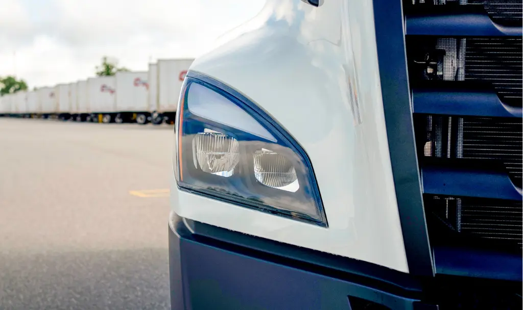 Truck headlight symbolizing logistics planning for 2025 supply chain challenges