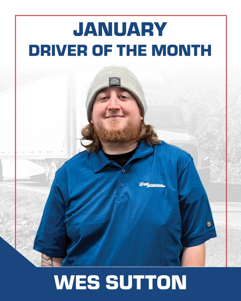 Wes Sutton, Cargo Transporters January 2026 Driver of the Month, wearing a Cargo Transporters polo shirt with a semi-truck in the background